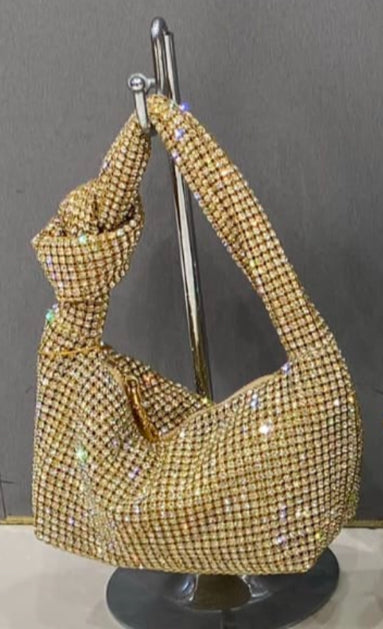 A DIAMANTÉ KNOT GOLD LARA LUXURY BAG .