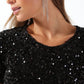 A SEQUIN SPARKLE BLACK DRESS